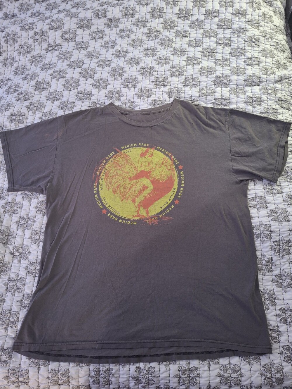 Gray Short-Sleeve Graphic Tee with Yellow & Orange Rooster Print. Has Holes